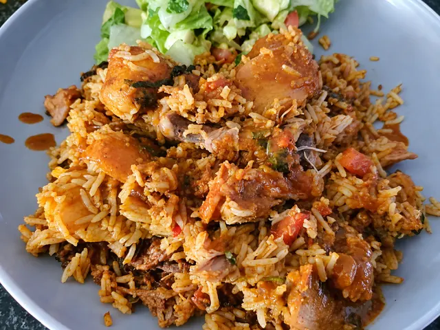 Chicken breyani topped with gravy