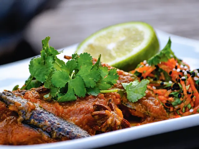 Dean Dickinson’s pickled fish garnished with herbs and lime