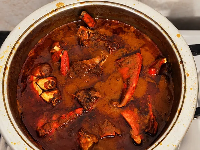 Durban crab curry cooking in a pot