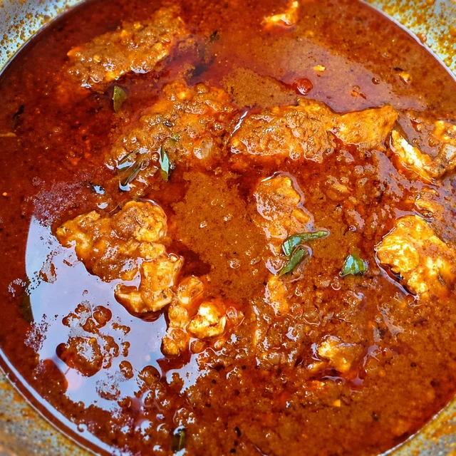 Durban fish curry with tamarind cooking in a pot