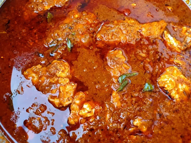 Durban fish curry with tamarind cooking in a pot