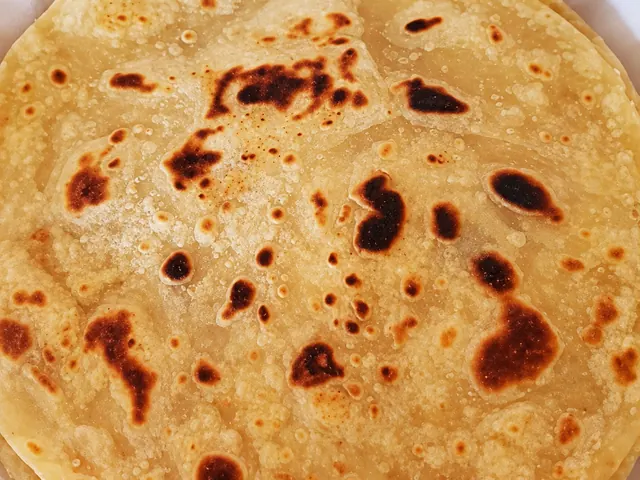Golden roti with browned spots