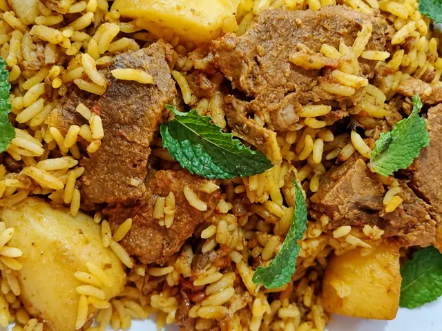 Lamb masala breyani with rice and fresh herbs