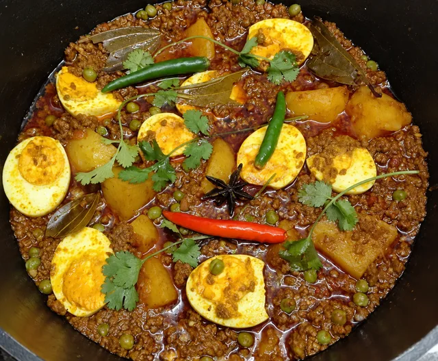 Mutton mince curry with potatoes and halved eggs