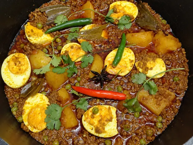 Mutton mince curry with potatoes and halved eggs