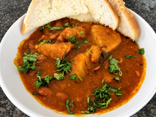 Pork and sugar bean curry served with bread