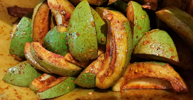 Spiced green mango pieces for Desa’s mango pickle
