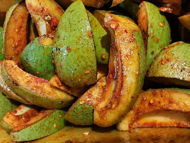 Spiced green mango pieces for Desa’s mango pickle