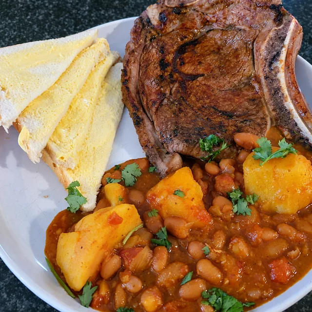 Sugar bean curry served with flame-grilled steak
