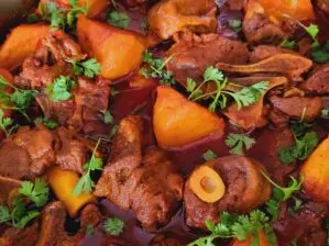 Aunty Maurine’s mutton curry with potatoes in a pot