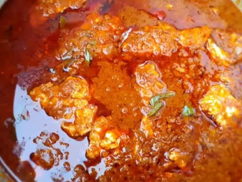 Durban fish curry with tamarind cooking in a pot