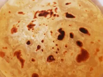 Golden roti with browned spots