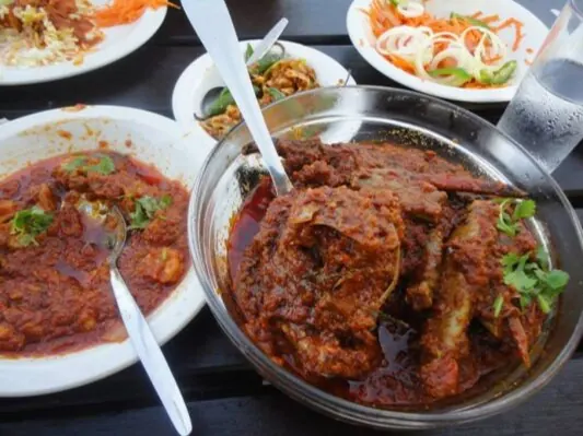 Govenders crab curry served with accompaniments