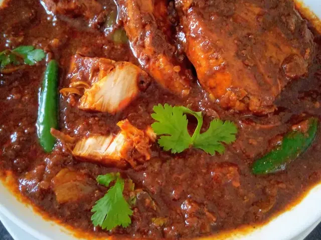 Irene Enoch’s fish curry on a plate