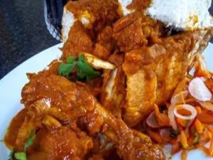 Irene’s chicken bunny chow with carrot salad