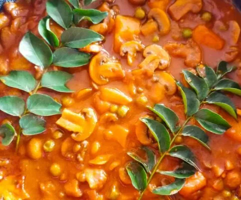 Mushroom, pea and potato curry with curry leaves