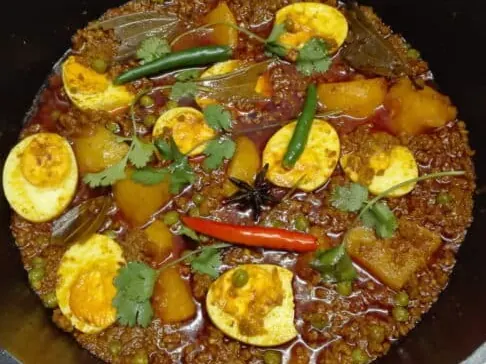 Mutton mince curry with potatoes and halved eggs