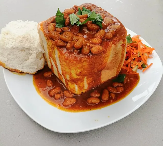 Sugar bean curry served as a bunny chow