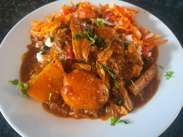 Tinned fish curry with potatoes and carrot salad