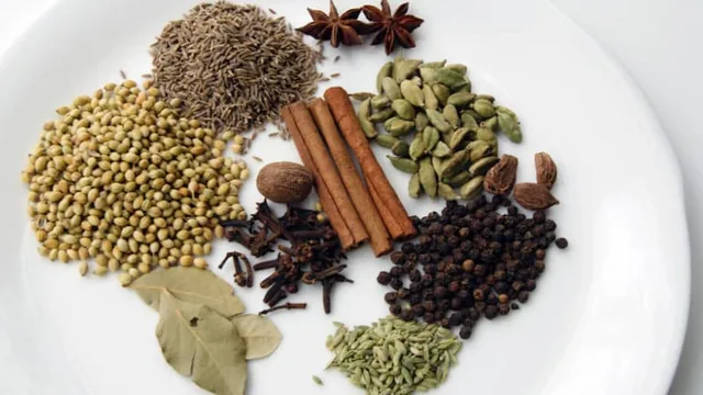 Whole spices including cinnamon, star anise and cardamom