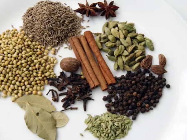 Whole spices including cinnamon, star anise and cardamom