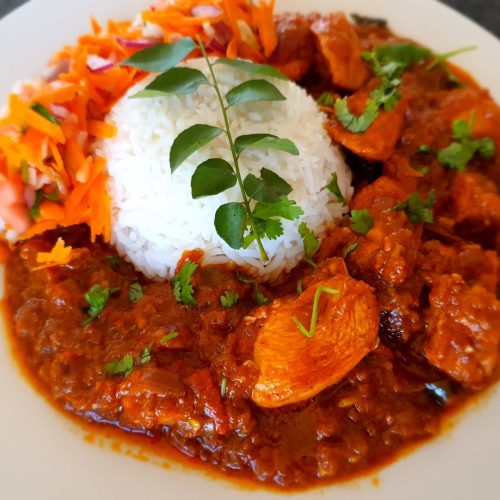 durban chicken curry with red onion
